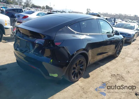 2023 Tesla Model Y Awd/Long Range Dual Motor All-Wheel Drive z USA, uszkodzony, nr VIN 7SAYGDEE1PA025933